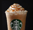 "焦糖 Frap" with whipped cream and drizzle inside a clear Starbucks plastic cup.