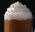 hot "白巧克力 摩卡" with whipped cream in a Starbucks mug