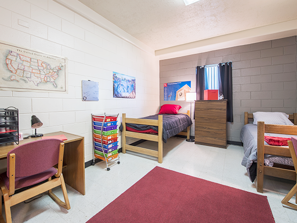 bedroom Bedroom featuring two twin beds and desks