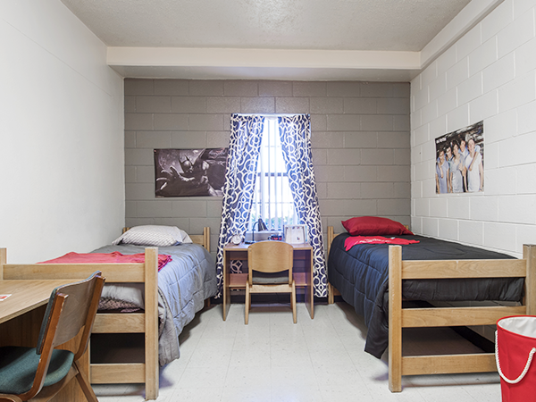 bedroom Bedroom featuring two twin beds and desks