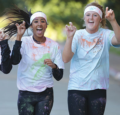 Intramural Sports Students running through a color run event