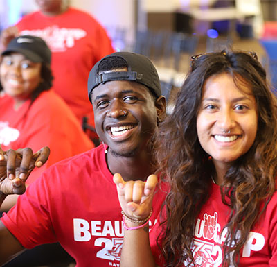 Student Activities Students posing with school spirit Bulldog hand sign