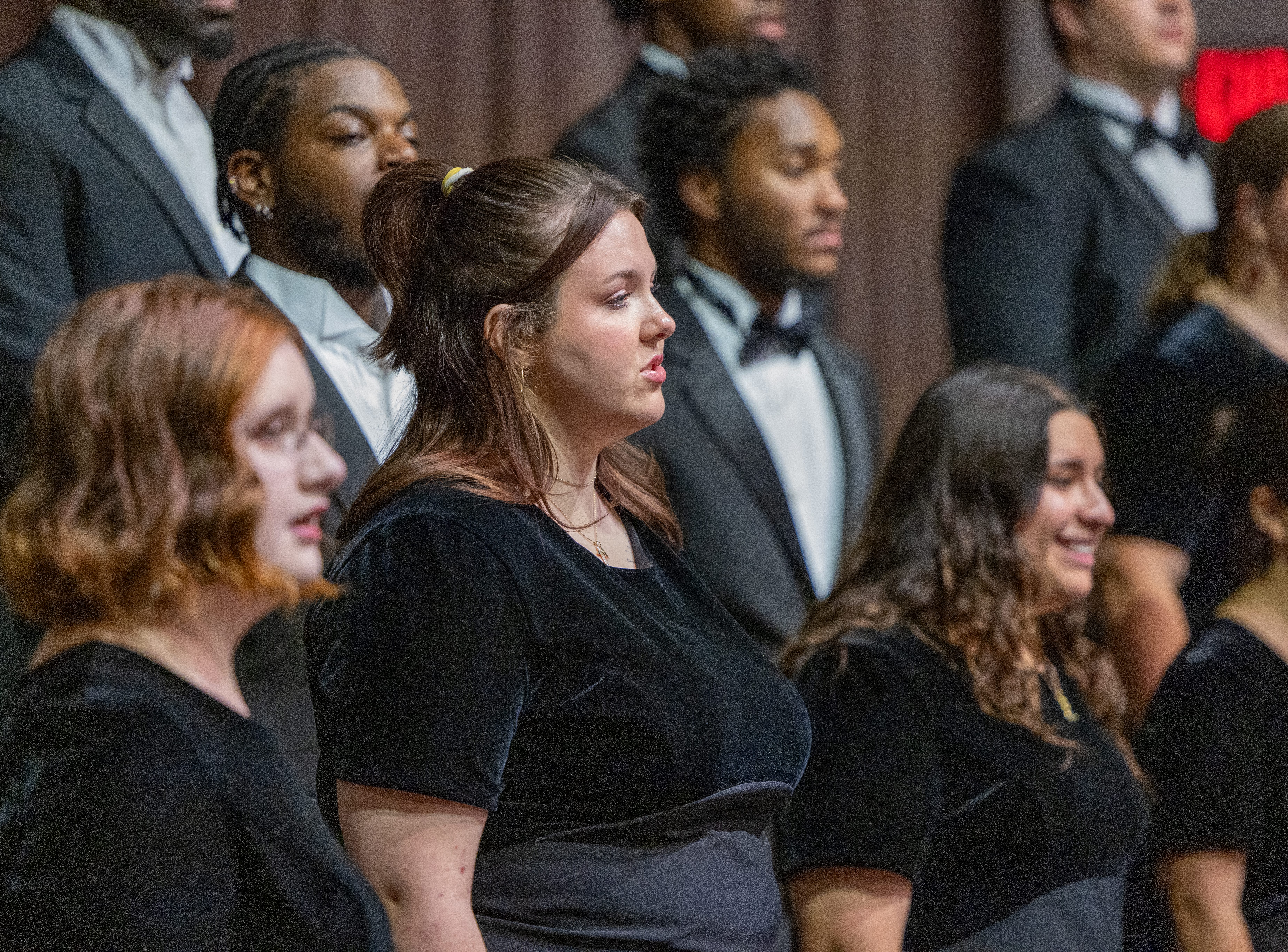 唱诗班 members singing in formation during Fall 2024 concert