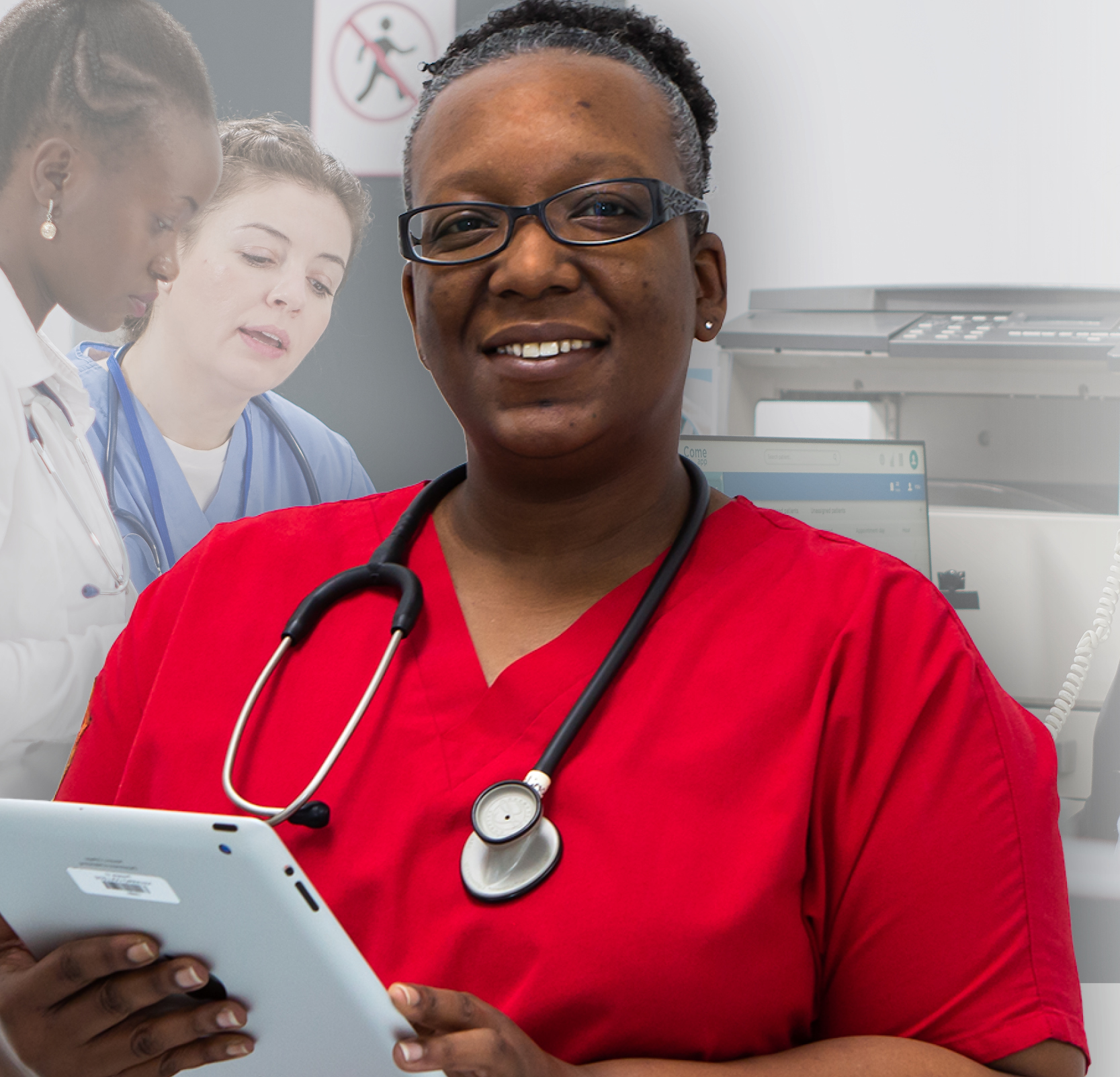 Healthcare Analysis 皇冠博彩 Student with stethoscope around neck while holding an iPad