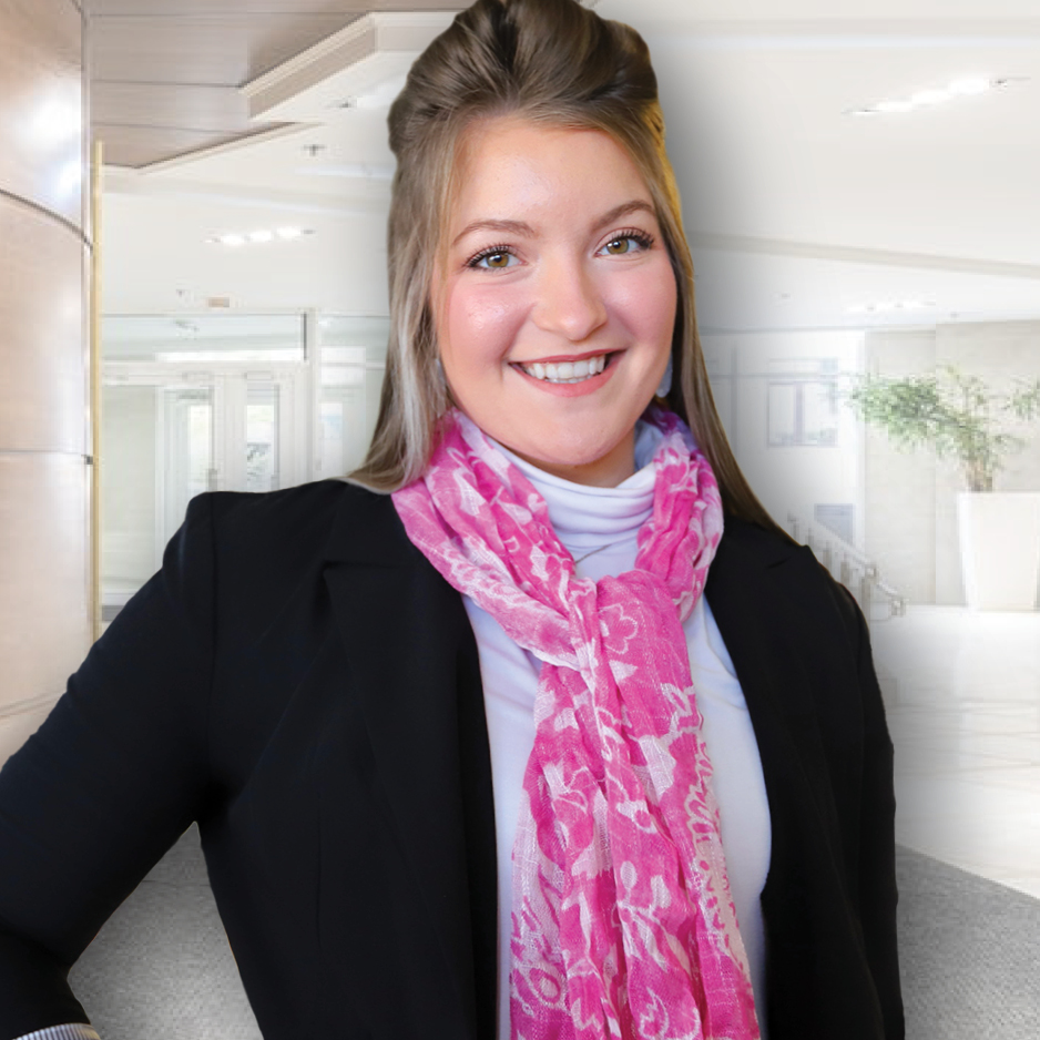 Hospitality Management Student in Hospitality Management position-smiling at camera