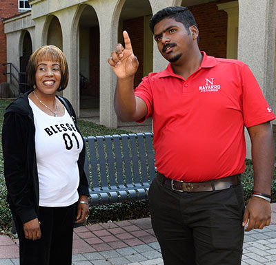 Part-Time Staff College recruiter showing a prospective person around campus