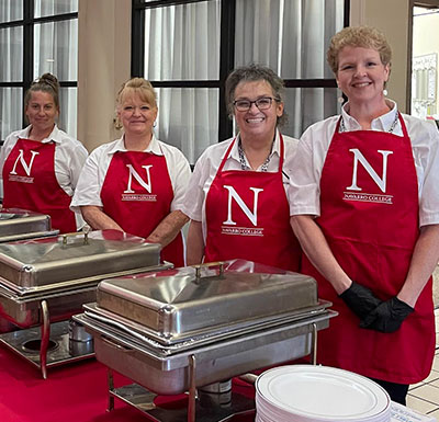 Staff Food servers smiling at the camera