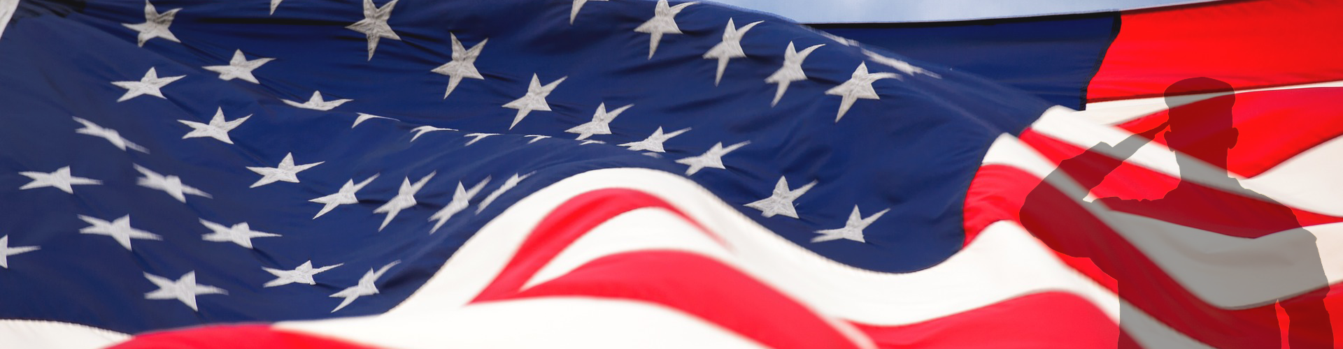 Veterans oversized American Flag waving in the wind